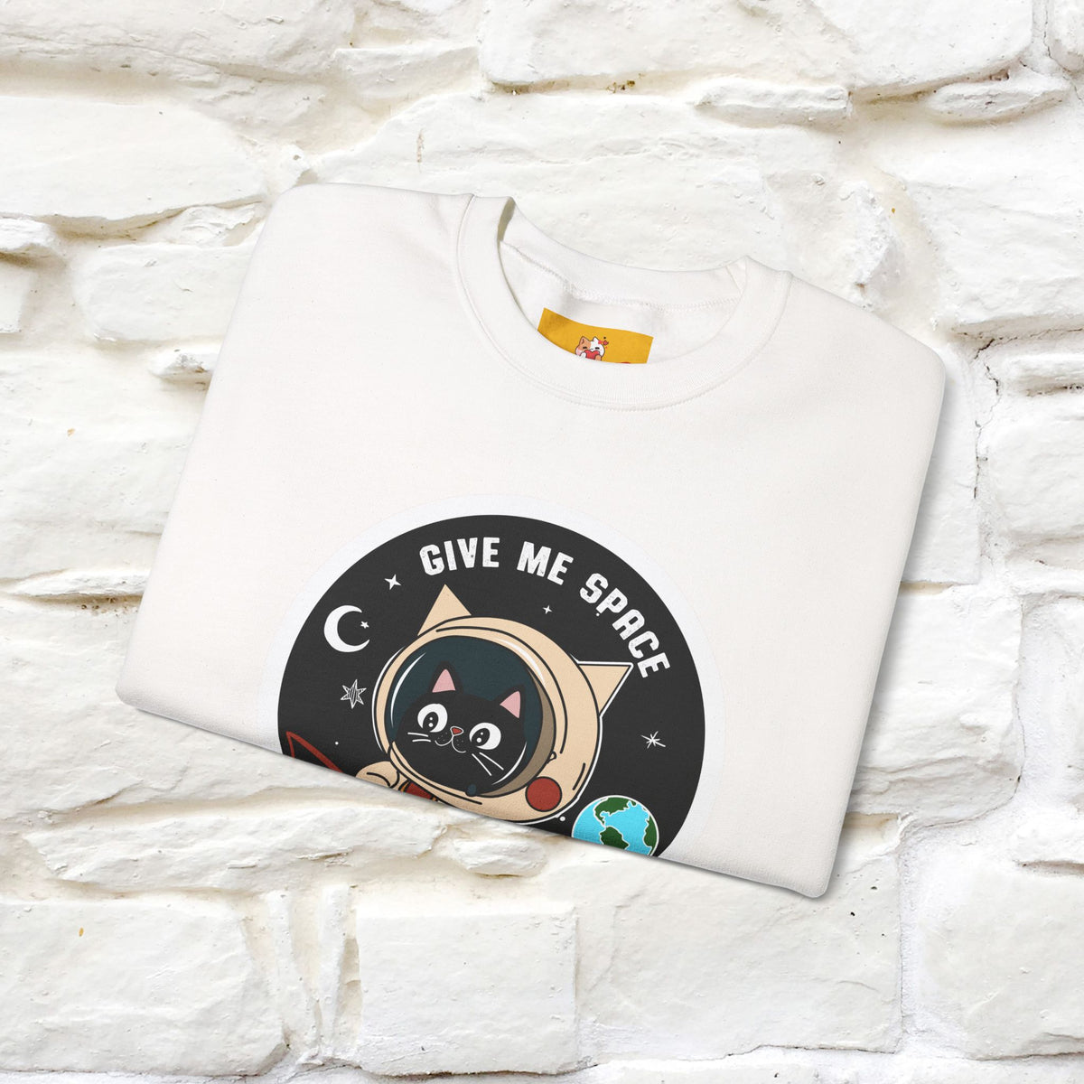 Folded Artistic cat sweatshirt with “Give Me Space, Art”  cat design